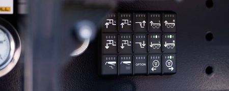 Control panel of the DOLL tronic operating and control system on the outside of a timber transport and heavy-duty transport vehicle